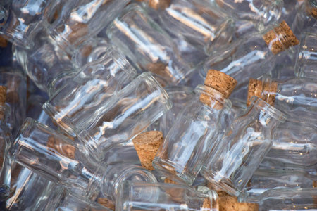 Set of Empty small  transparent bottles in a box