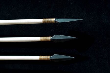 Antique old wooden arrowsの写真素材