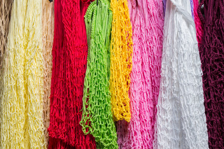 Empty mesh bags of various color  at a market place