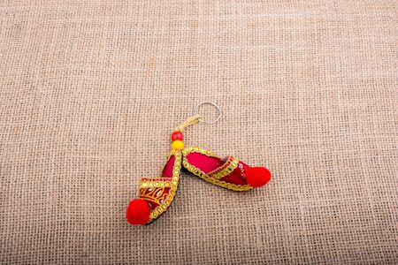 Traditional slippers on canvasvbackgroundの写真素材