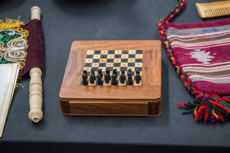 Chess board with chess wooden pieces