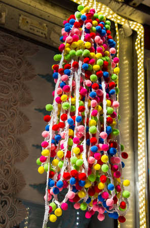 Set of the colorful  pompoms in the bazaarの写真素材