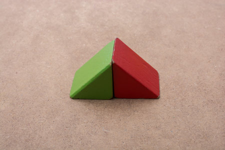 Colorful building  blocks on a brown background