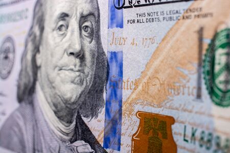 Close up of Benjamin Franklin face on 100 US dollar billの写真素材