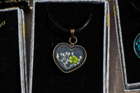 Colorful decorative objects in the shape of a heartの写真素材