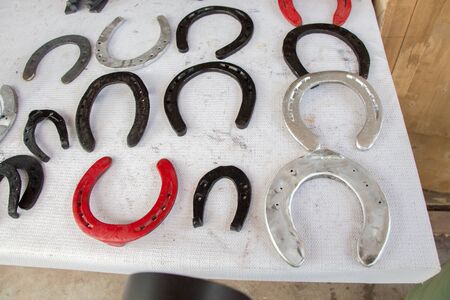 Lucky  horse shoes made of metal with nail holesの写真素材