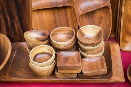 Empty bowls made of wood of brown colorの写真素材