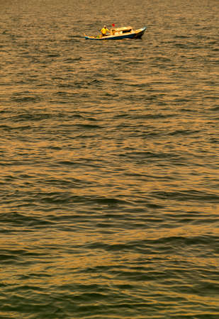 Fishing boat  in moving in the seaの写真素材