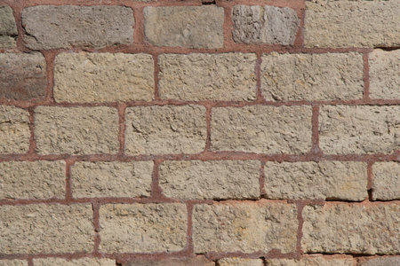 Wall made of the same type and same color of stones