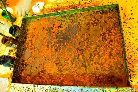 Colorful ebru or art of Marbling background on water surfaceの写真素材