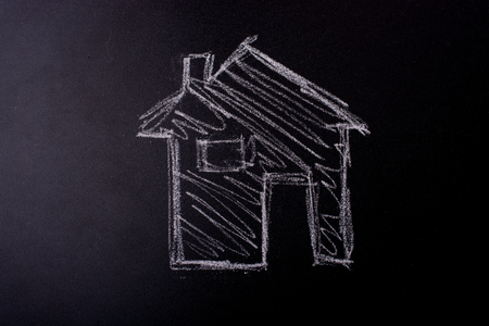 House shape is drawn on a blackboardの写真素材