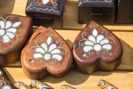 Colorful decorative objects in the shape of a heartの写真素材