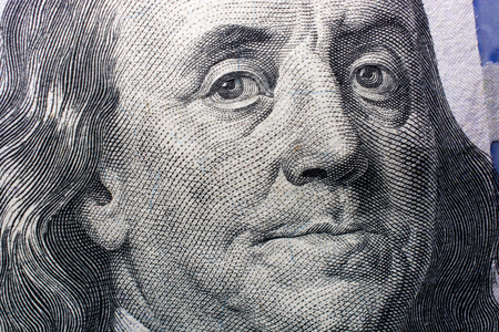 Close up of Benjamin Franklin face on 100 US dollar billのeditorial素材