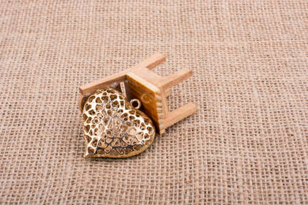 Little heart shape on a chair on canvasの写真素材