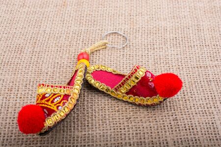 Traditional slippers on canvasvbackgroundの写真素材