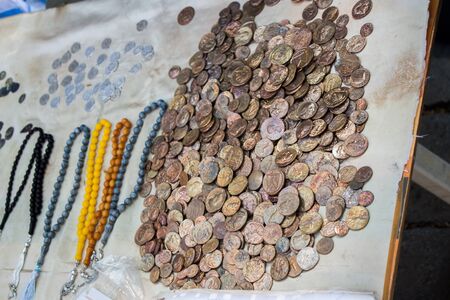 Antique metal coins collectiion as a backgroundの写真素材