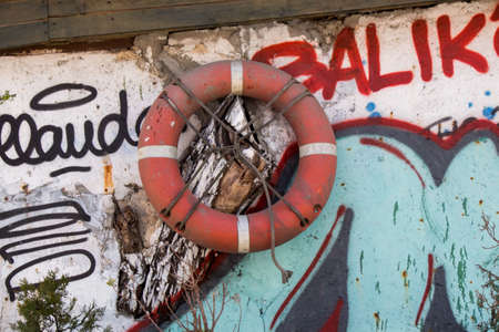 Life preserver or life saver hanging in airの写真素材