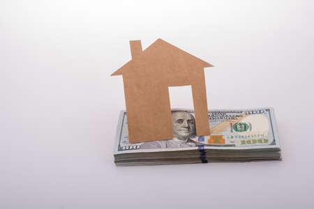 Banknote bundle of US dollar placed on a white backgroundの写真素材