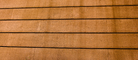 Texture details of an old wooden plunks as background