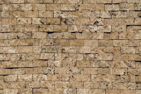 Wall made of the same type and same color of stones