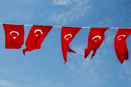 Turkish national flag in open air on a ropeの写真素材
