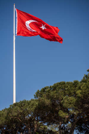 Turkish national flag hang on a pole in open airの写真素材