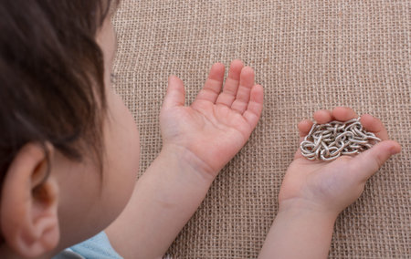 Chain made of gold color in hand