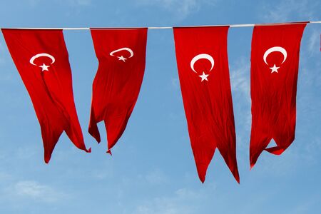 Turkish national flag in open air on a ropeの写真素材