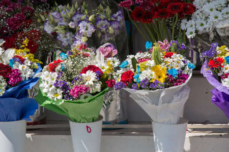 Beautiful flowers of various types in a flower in vaseの写真素材