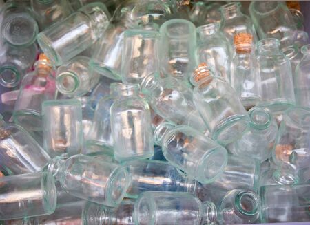 Set of Empty small  transparent bottles in a boxの写真素材