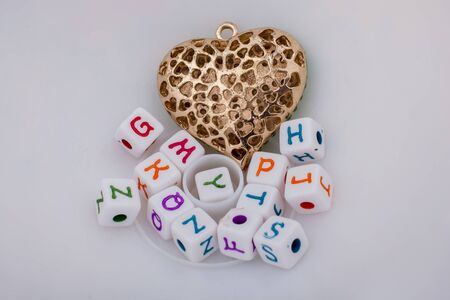 Back to school theme with a heart on whiteの写真素材