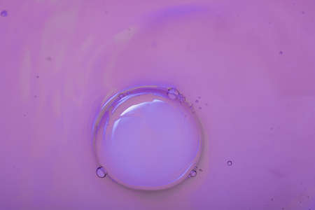 Colorful water bubles on water as abackgroundの写真素材