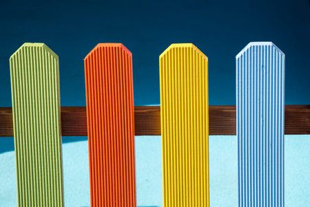 Close up of a part of decorative colorful wooden fence