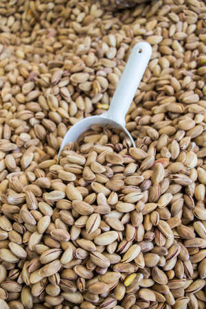 Pistachio nuts with shell ready to eatの写真素材