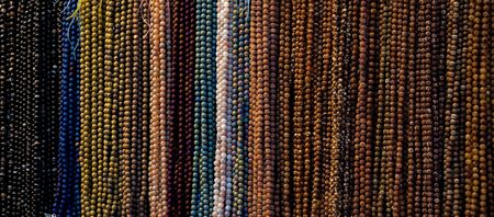 Colorful beads of various color at a marketの写真素材
