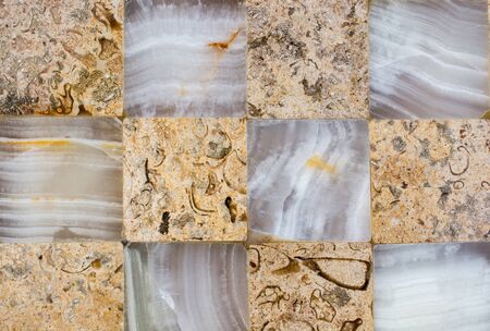 Decorative cubic stone wall as background textureの写真素材