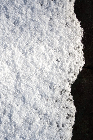 Snow winter background mostly in white color