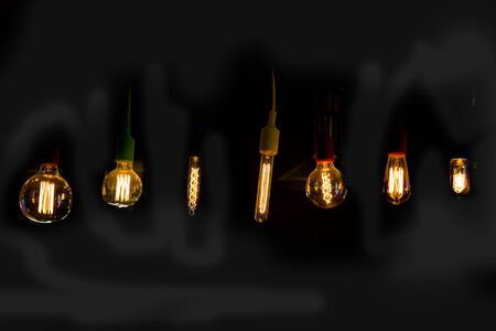 Decorative antique edison style filament light bulbs hangingの写真素材