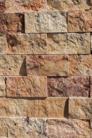 Decorative cubic stone wall as background texture
