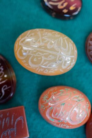 natural mineral gemstones with Arabic textの写真素材