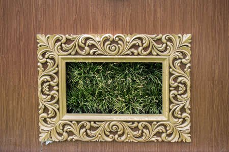 Photo frame made of wooden material in viewの写真素材