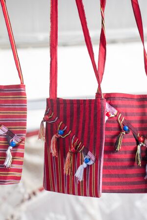 Traditional style handmade woven bags made of fabricの写真素材