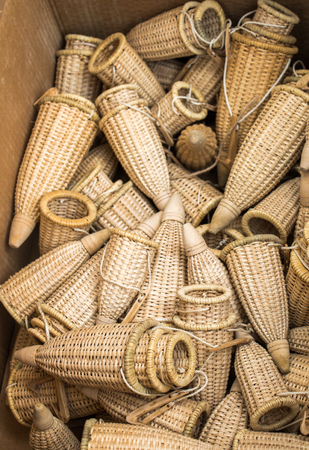 Empty wicker baskets are for sale in a marketの写真素材