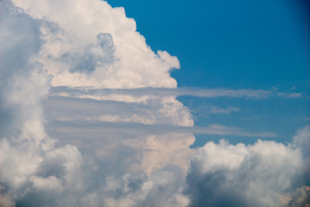 Dark and grey clouds are in the skyの写真素材