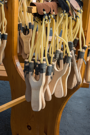 Set of wooden catapult slingshot ready to useの写真素材