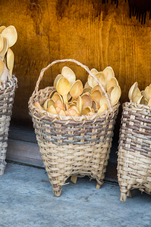 Empty wicker baskets are for sale in a marketの写真素材