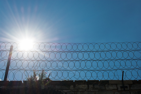 barbed wire fence  used for protection purposesの写真素材