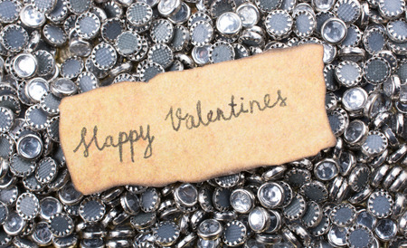 Valentine's day wording on torn paper as Love conceptの写真素材