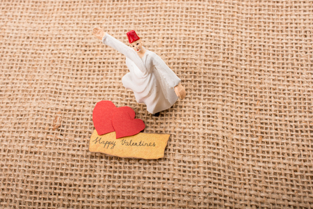 Love icon and Valentine's day wording on torn paperの写真素材