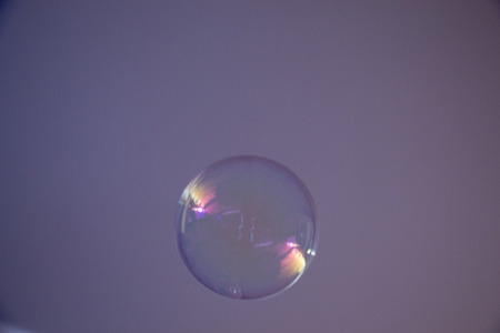 Blown single soap bubble in  the airの写真素材